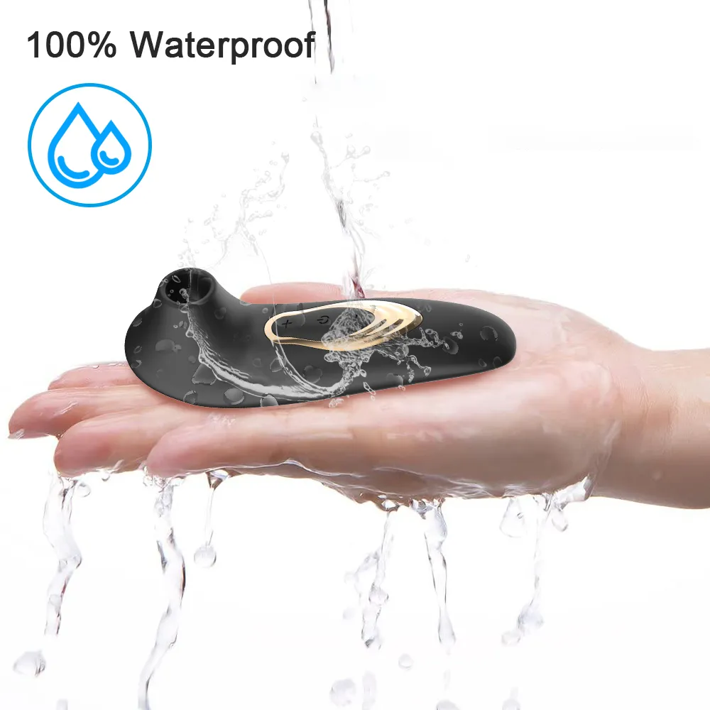 Hand holding waterproof device under running water.