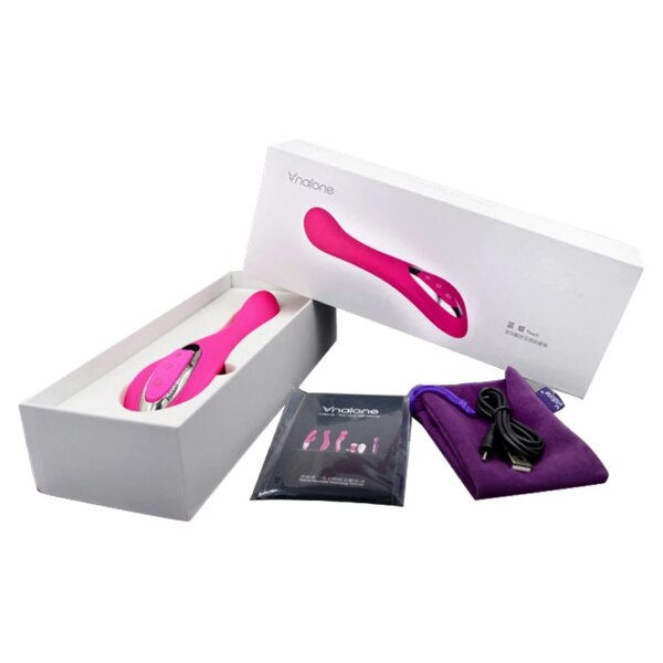 Pink personal massager with accessories and packaging.