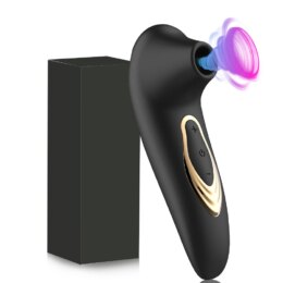 Black personal massager with gold accents and packaging.
