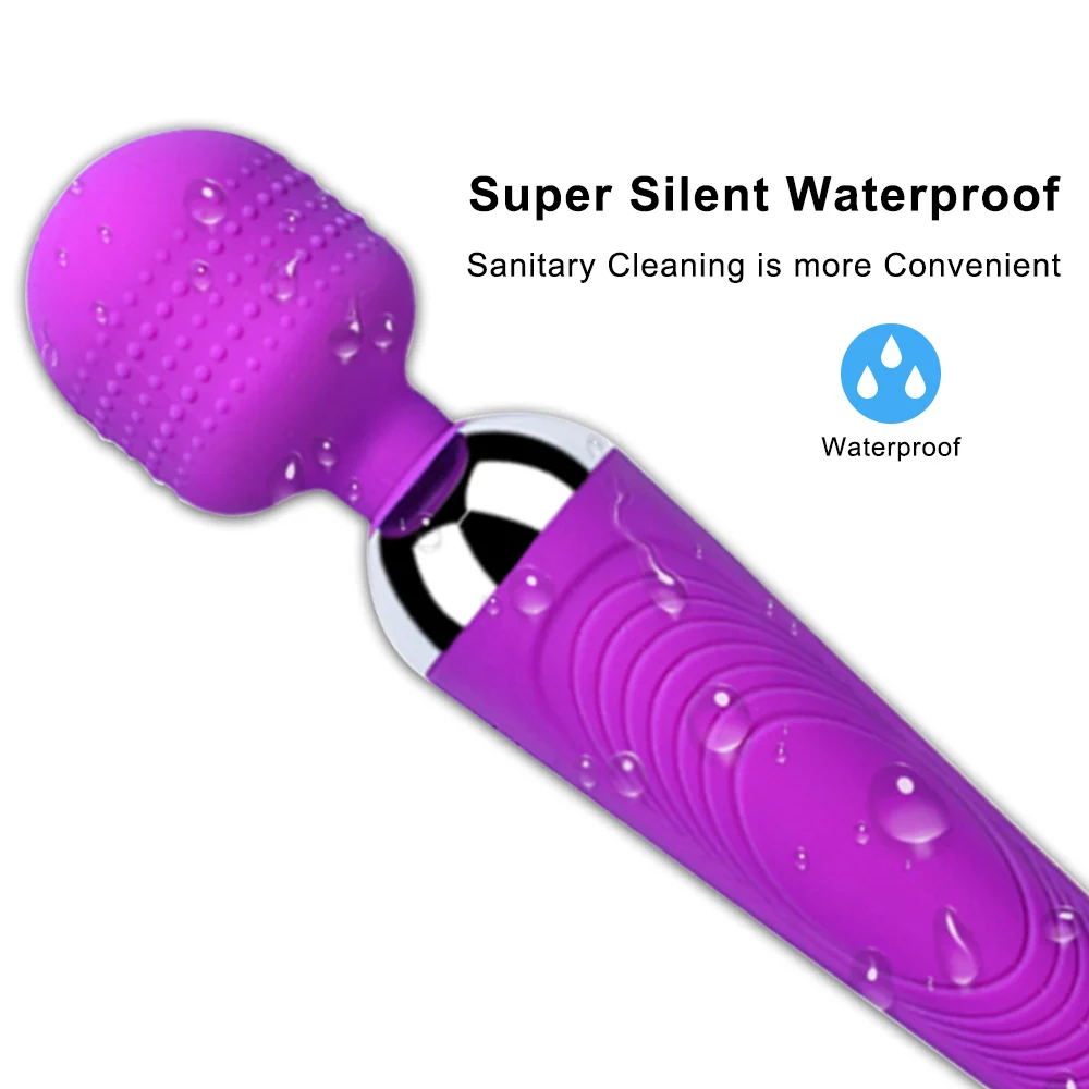 Purple waterproof massager with textured head, water droplets.