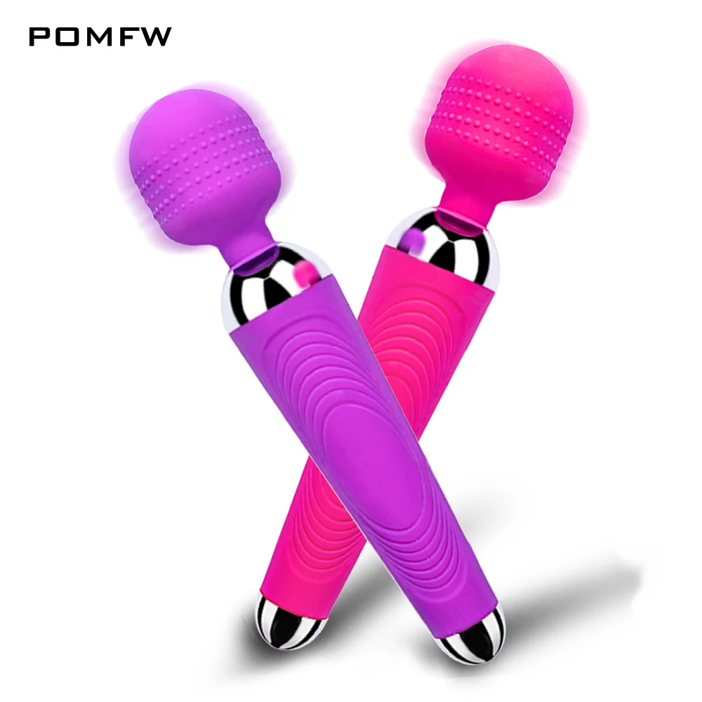 Colorful handheld massager devices on white background.