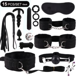 Black BDSM bondage kit with various restraints and toys.
