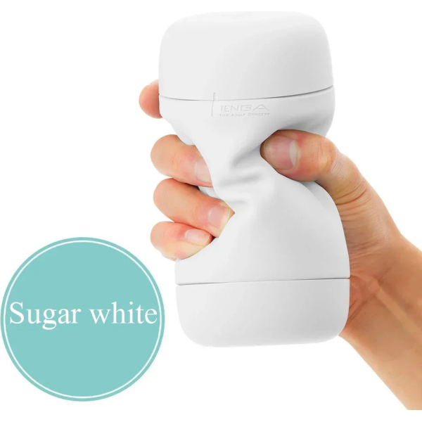 Hand squeezing white textured object