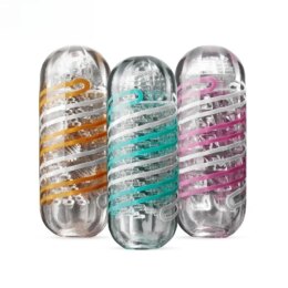 Three colorful capsule-shaped washing machine lint catchers
