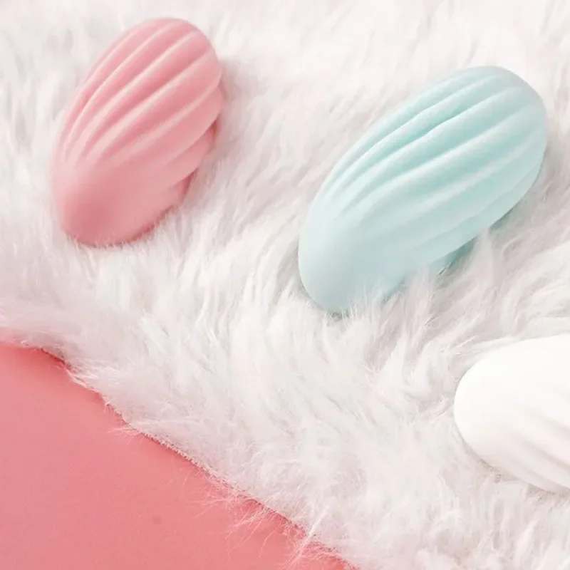 Pastel ribbed oval soaps on white fur